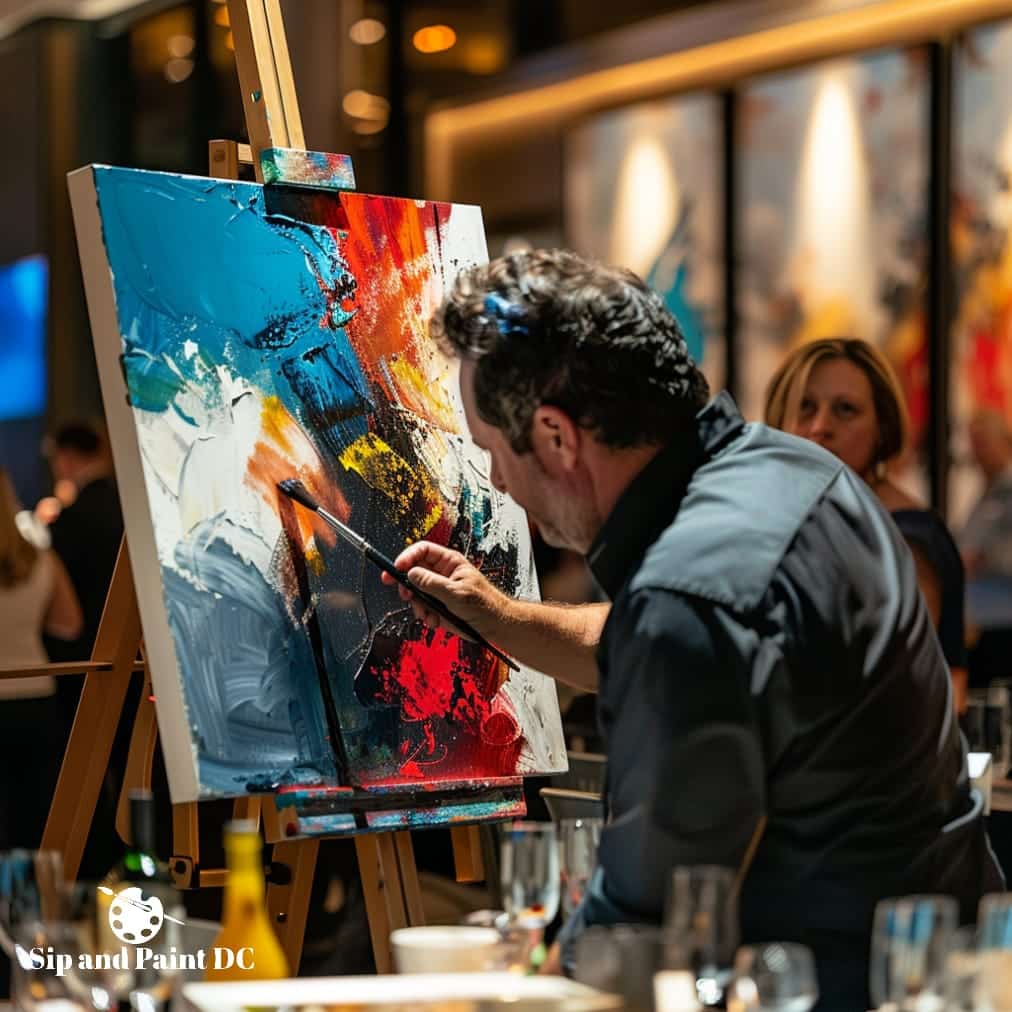 A man painting on an easel in a restaurant.