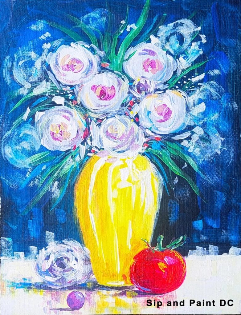 A yellow vase with white flowers. Perfect for a relaxing paint and sip or sip and paint session.